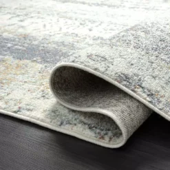 Milas Cream 5 ft. 3 ft. x 7 ft. 6 in. Oriental Polypropylene Area Rug by Abani -Abani Sales cream abani area rugs mil170a 5 4f 1000