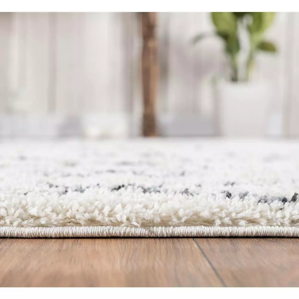 Willow Ivory 7 ft. 9 in. x 10 ft. 2 in. Shag Polypropylene Area Rug by Abani 8 Willow Ivory 7 ft. 9 in. x 10 ft. 2 in. Shag Polypropylene Area Rug by Abani - Image 6